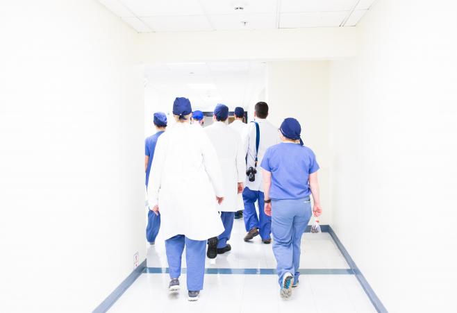 Group of Doctors walking in corridor