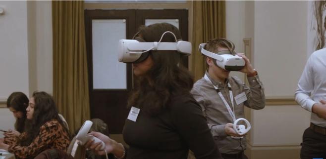 Photo of people wearing VR headset