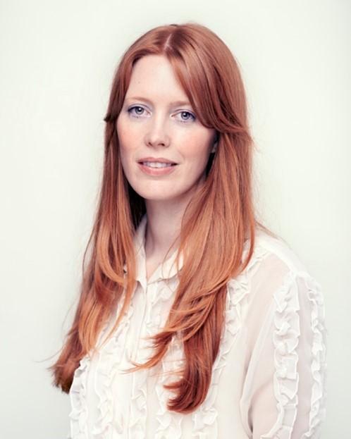 Portrait Picture of Kelsie Espie-Whitburn wearing a white ruffle shirt