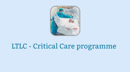 Picture of a patient in a hospital bed being pushed by a healthcare worker in PPE. The words